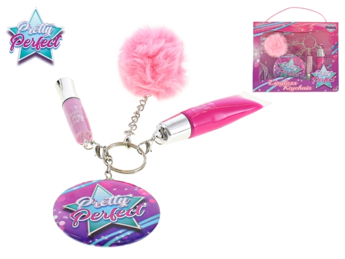 Pretty Perfect pom pom key ring with 2x lipgloss and mirror in handbag