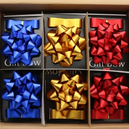Rosette 120 mm + ribbon 25 mm x 3 m (mix of 6 metallic colours) on blister (1)